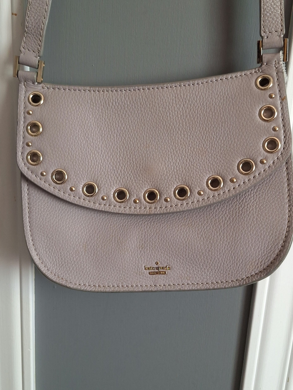 Kate Spade; Pebbled Leather Crossbody in Light Purple Blush with Gold Eyelets